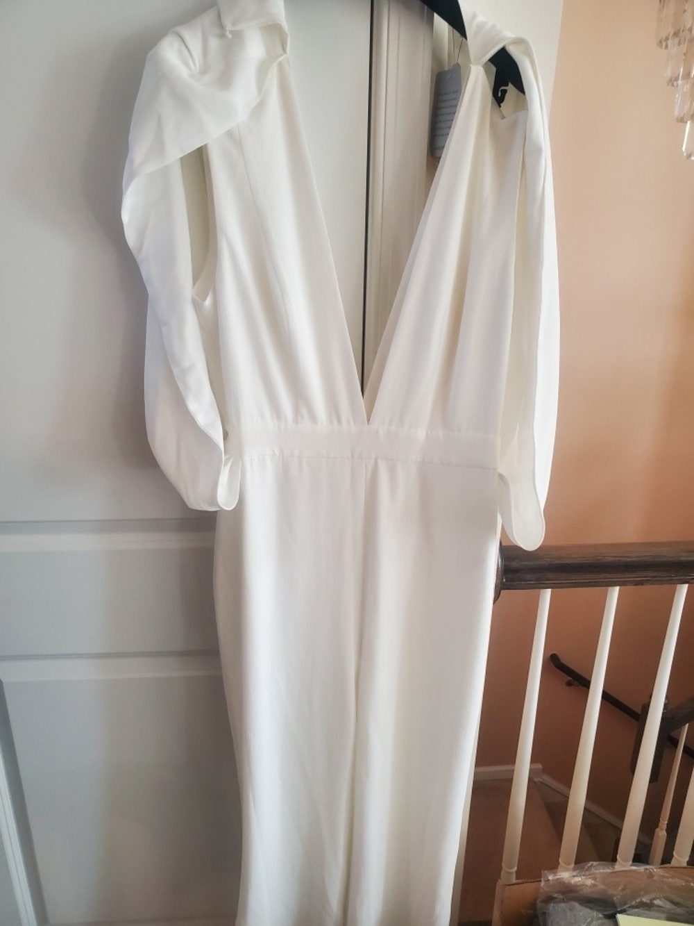 Elegant White Deep-V Women's Jumpsuit. Mishika Collection